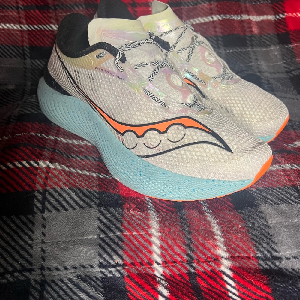 Saucony Running Shoes with Blue and Orange Accents